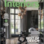 A magazine cover with the words " interiors " written in green.